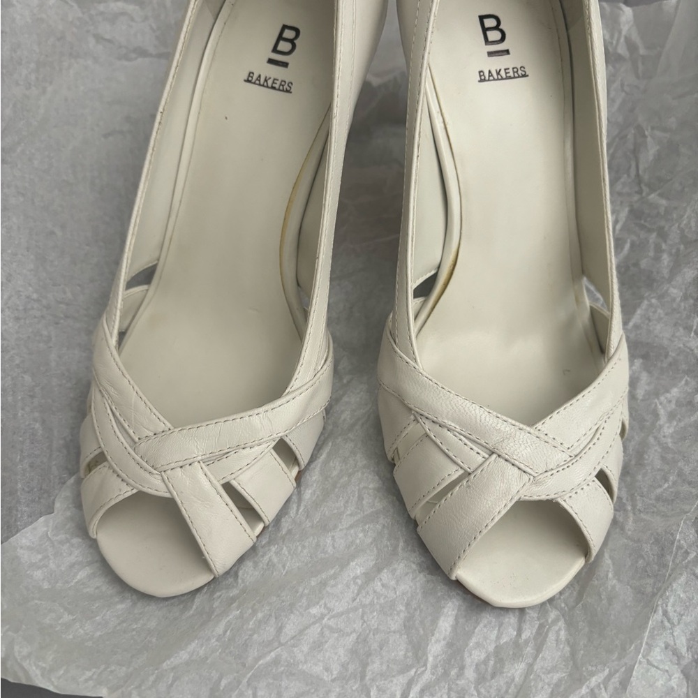 Bakers pretty off white heels! Very comfortable!